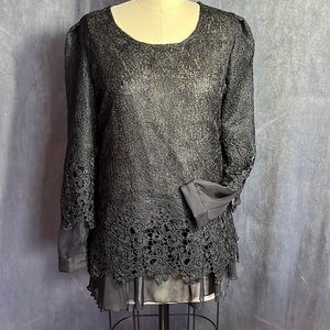 Black lace and chiffon long sleeved tunic top. Size L fits like a size 8.